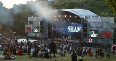 A lively outdoor concert at a music festival in Paredes de Coura, Portugal.