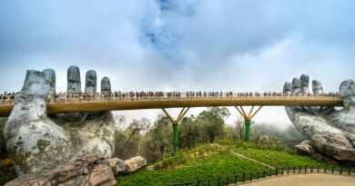 Golden Bridge in Da Nang held by giant stone hands, a popular tourist attraction.