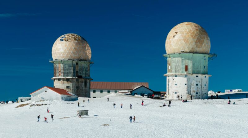 A winter scene featuring Serra da Estrela's observatory in snowy Distrito da Guarda, Portugal.